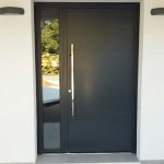 Photo porte d'entrée monobloc alu contemporraine