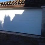 Photo porte de garage sectionnelle blanche