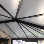 veranda aluminium intérieur avec verre blanc